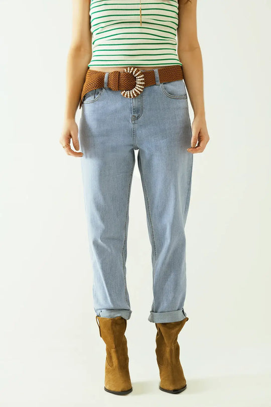 Boyfriend light blue jeans with stitching details on the edges