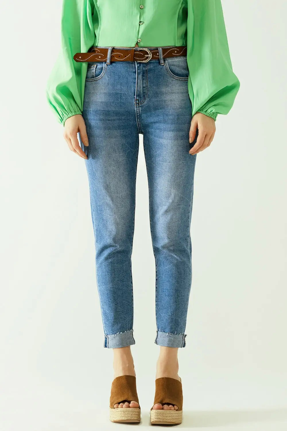 Washed effect push-up jeans with five pockets and hem