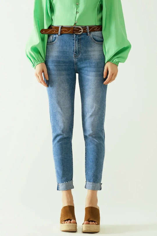 Washed effect push-up jeans with five pockets and hem