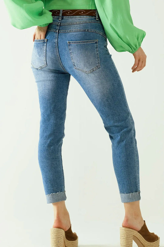 Washed effect push-up jeans with five pockets and hem