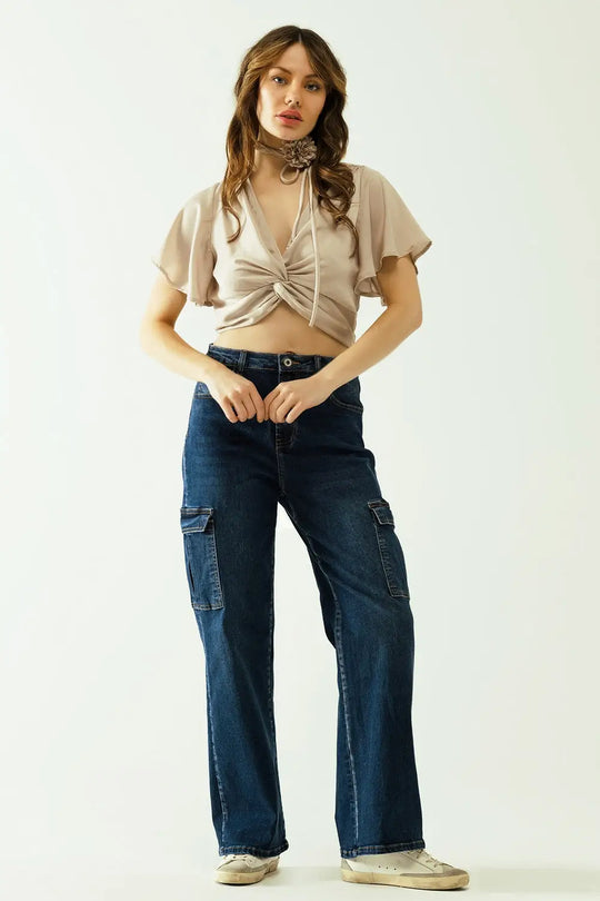 Beige V-neck crop top with short sleeves and a flower detail on the neck - Tops