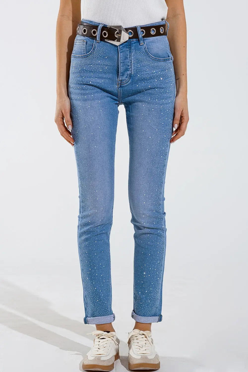 Skinny jeans in washed blue with strass all over the front