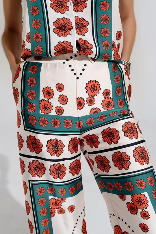 Satin Creme Flared Pants With Floral Design - Pants