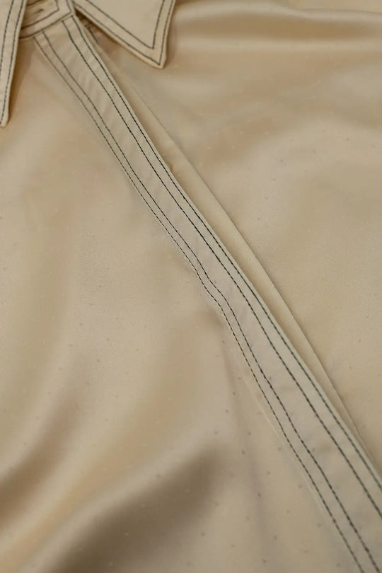 Sleeveless Blouse with pollo collar in beige - Shirts