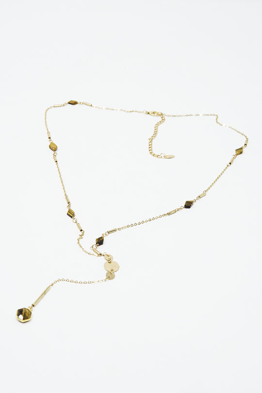 Golden necklace with stone detail and pendant