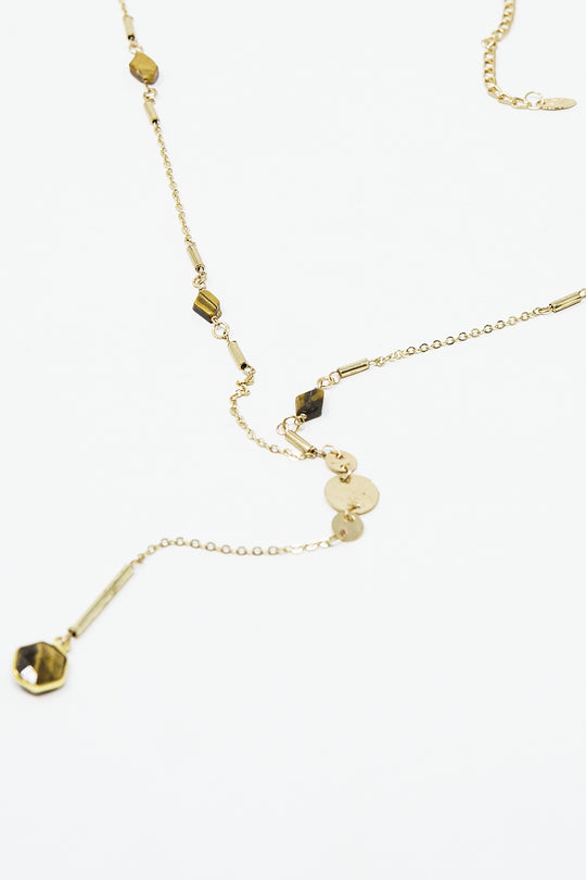 Golden necklace with stone detail and pendant