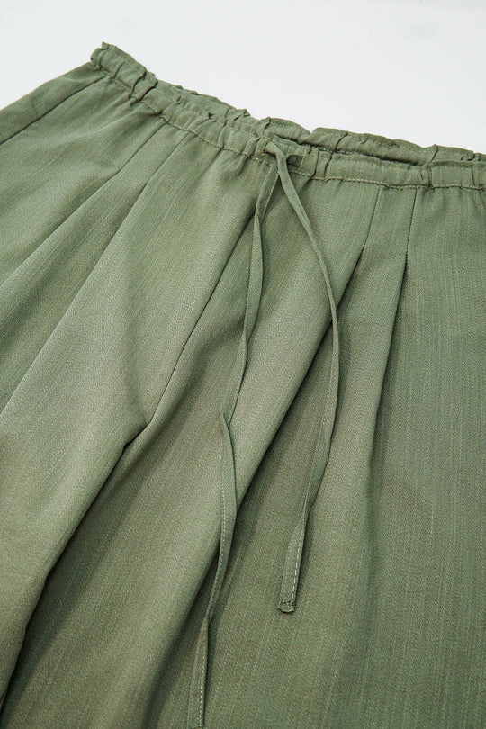 Light Green Relaxed Pants With Drawstring Closing And Side Pockets