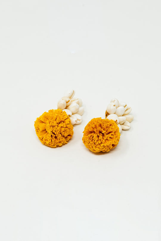 Earrings With Cream Seashells and Yellow Pom Poms