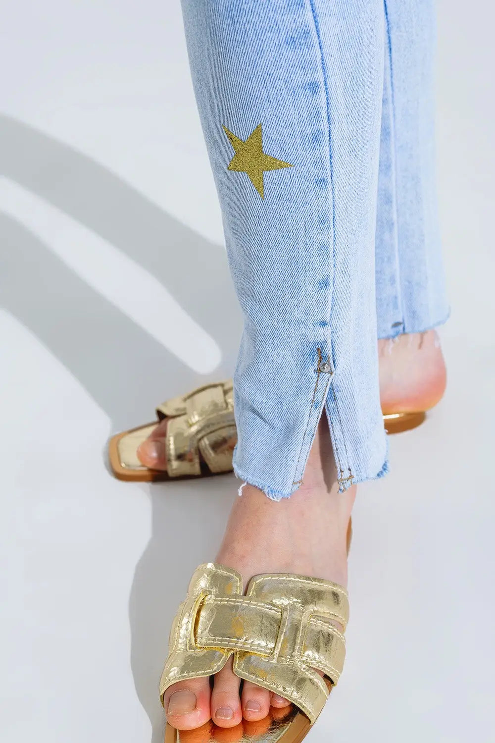 Light Wash Skinny Jeans With Stars On The Legs