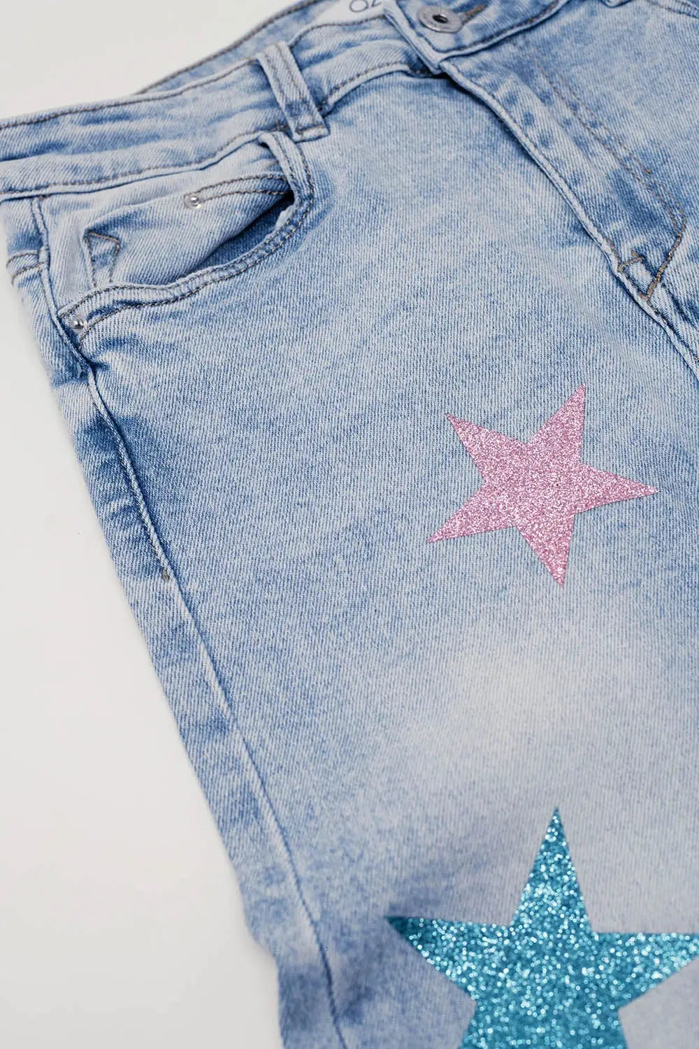 Light Wash Skinny Jeans With Stars On The Legs
