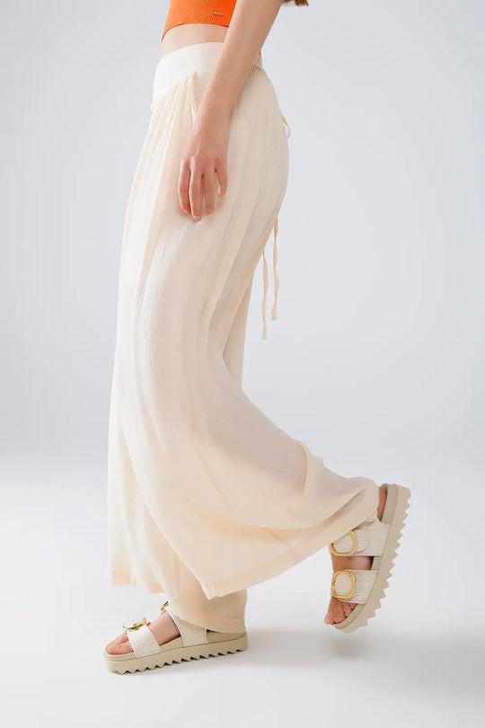 Beige Palazzo style Pants With Side Pockets And Thick Waist Band - Pants