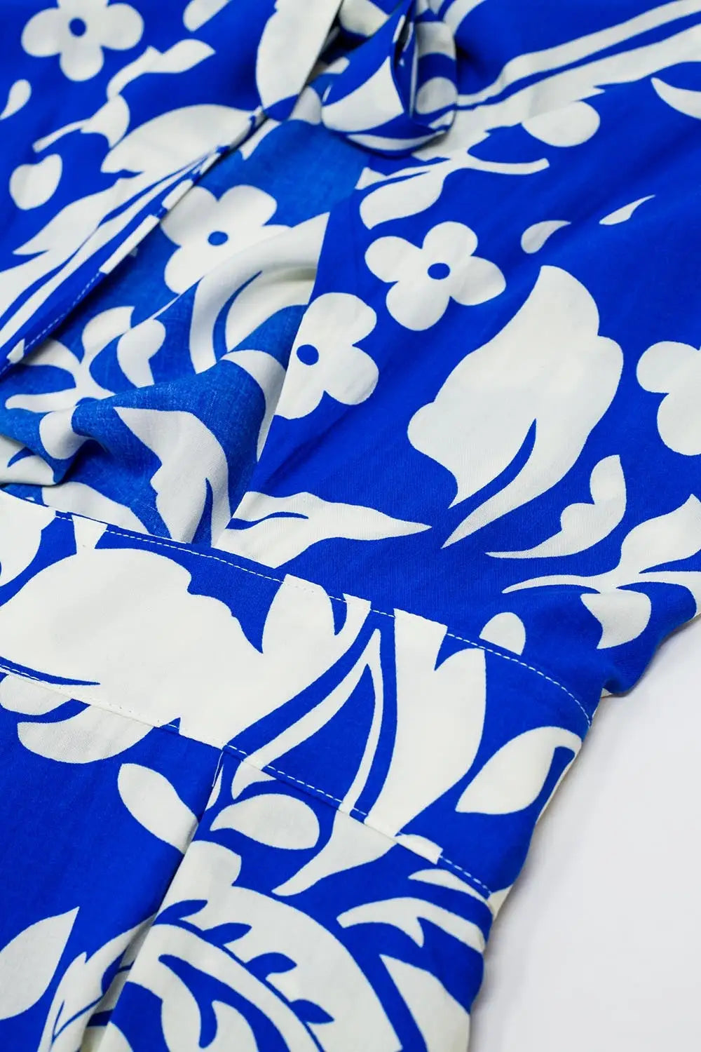 Short Sleeve Key Hole Front Floral Jumpsuit In Blue - Jumpsuits