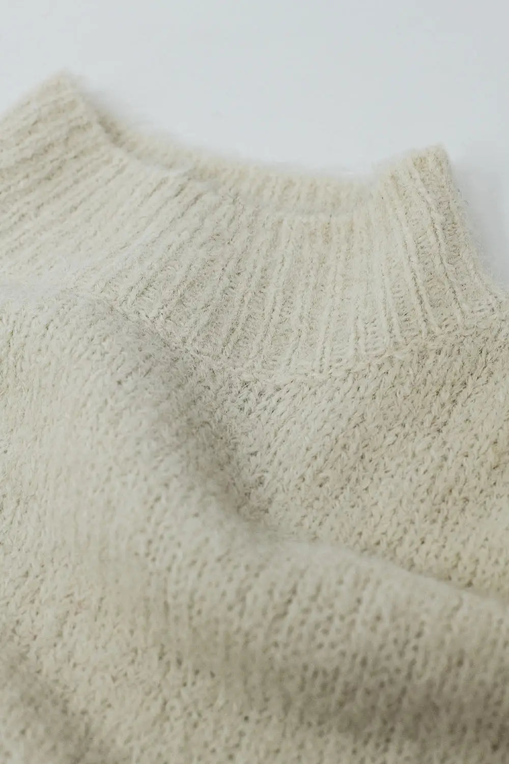 Fluffy beige sweater with high neck and balloon sleeves - Sweaters
