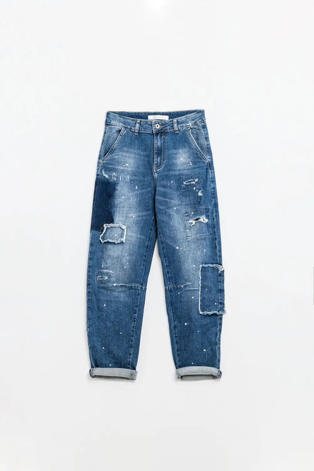 Loose-fitting jeans with distressed patches and paint details