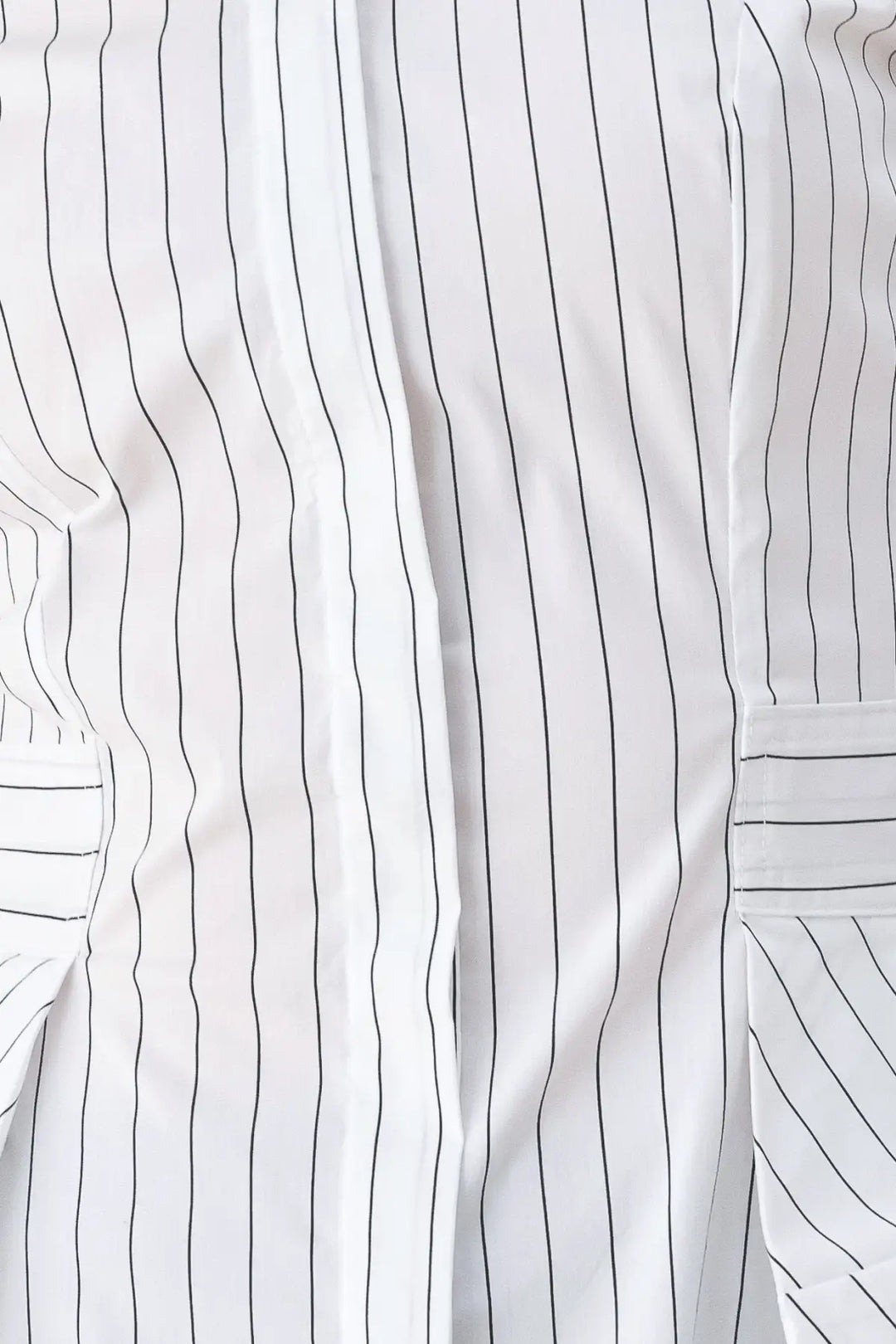 MODERNIST PINSTRIPE FLARED-WAIST WOVEN TOP
