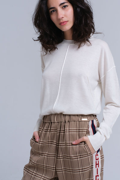 Q2 Asymmetric sweater in cream