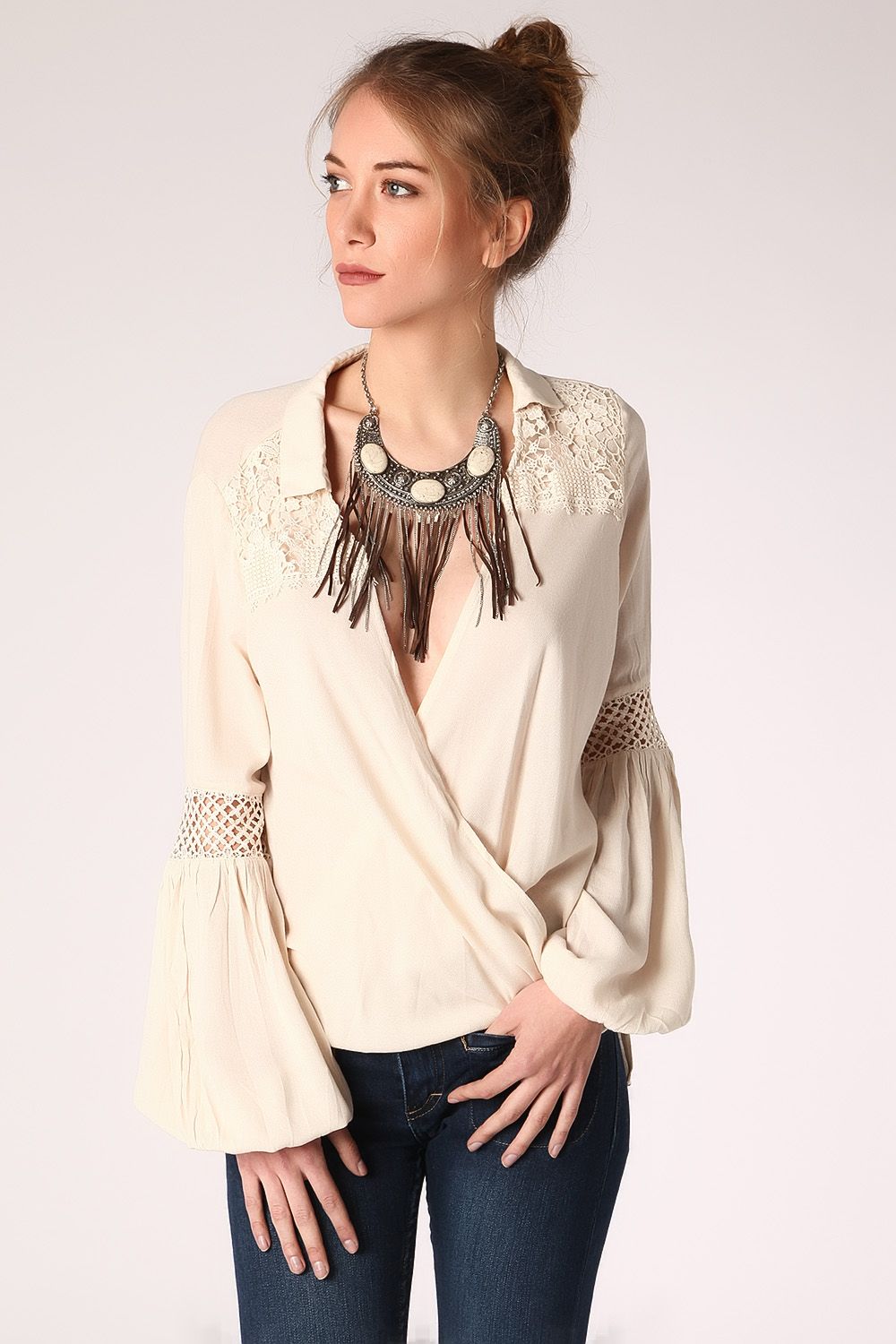 Beige blouse with wrap front and draped detail