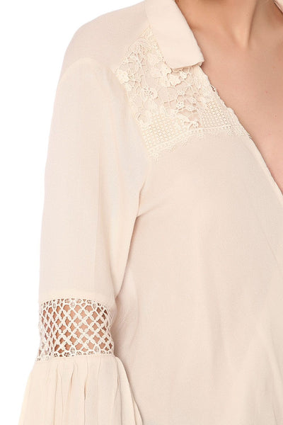 Beige blouse with wrap front and draped detail