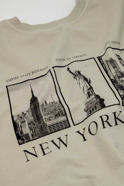 Beige long-sleeved sweatshirt with new york city printed