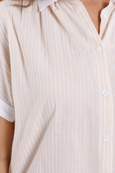 Beige shirt with short sleeves and vertical stripes