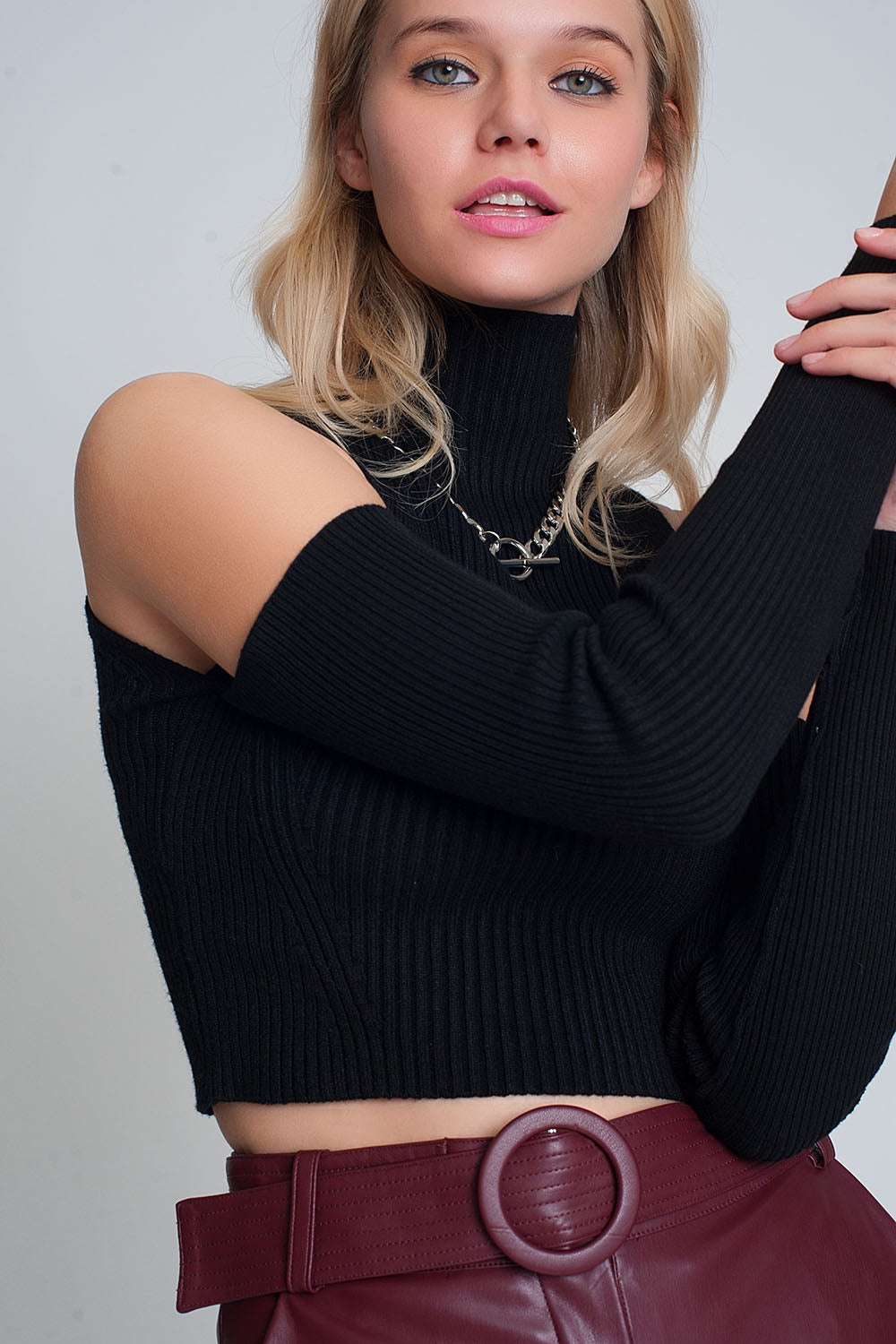 Black cut out rib sweater in fine knit