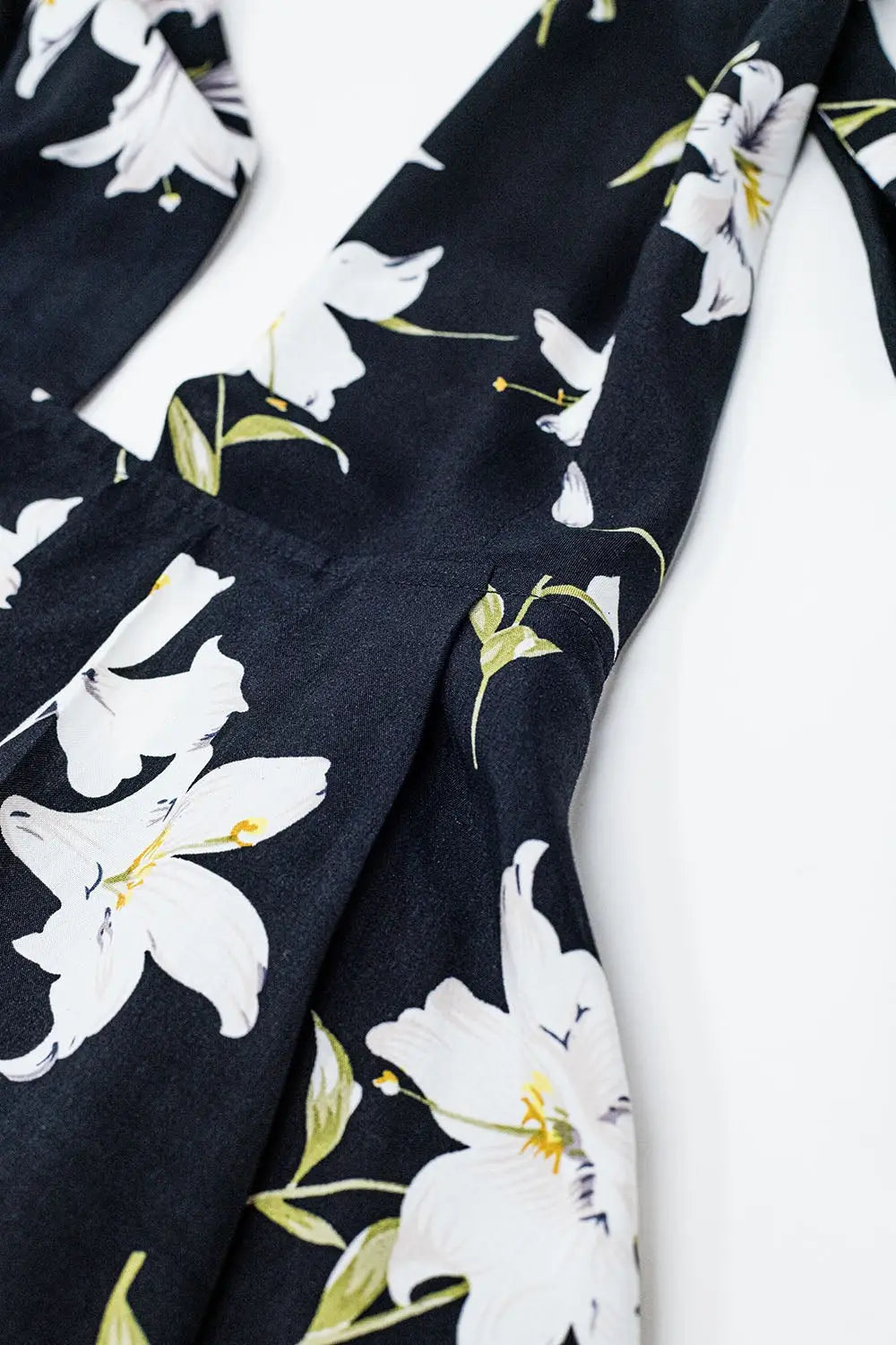 Black halterneck playsuit with floral print - Dresses