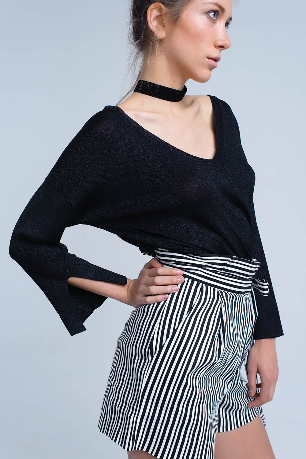 Black knit sweater with gold lurex detail