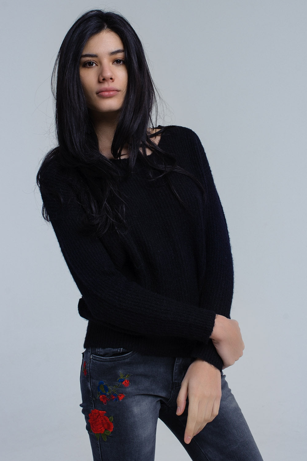 Black knitted sweater with tie-back closure