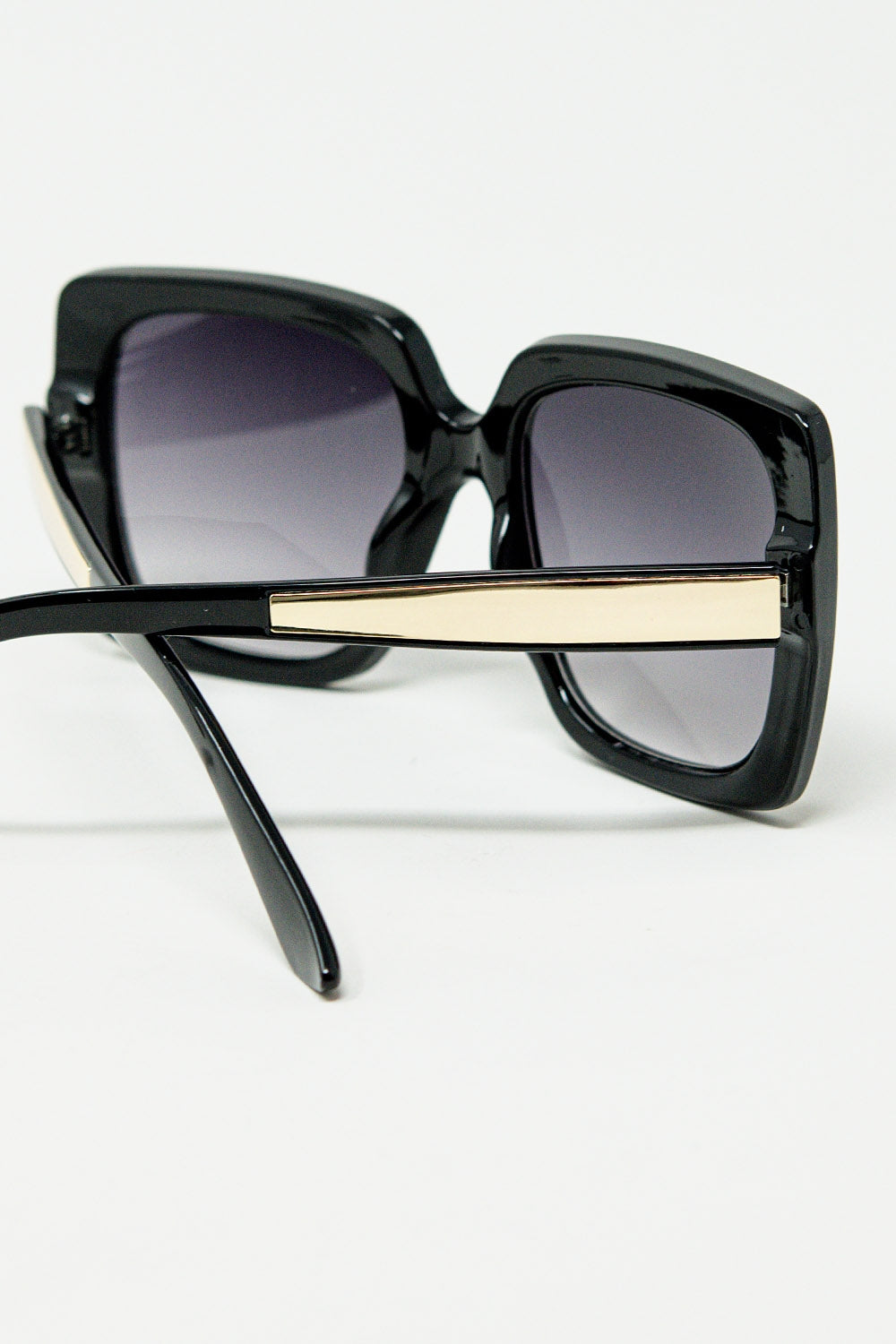 black Oversized square sunglasses with golden metallic detail