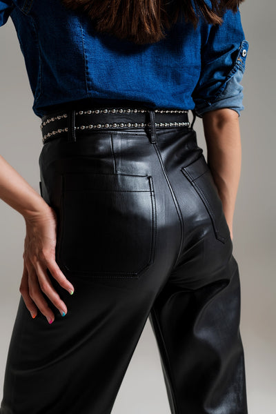 black palazzo-style faux leather pants with pocket detail