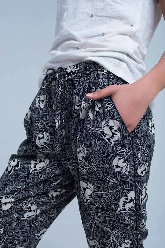 Black pants with floral print - Pants