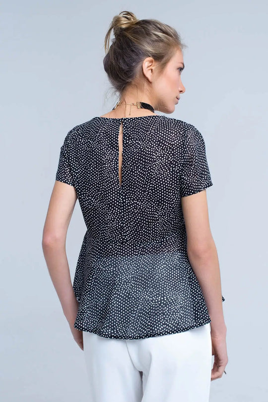 Black polka dot top with ruffle hem - Shirts