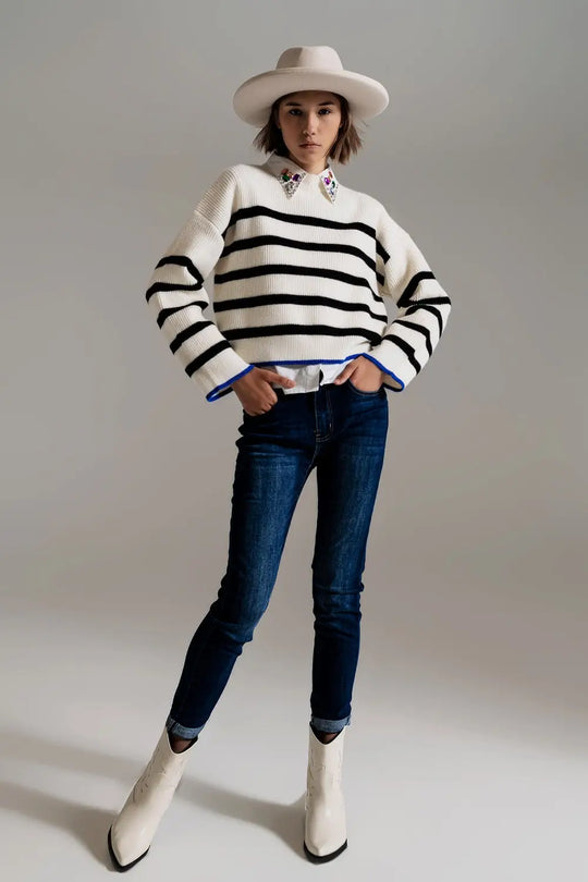 black striped jumper with blue stripe detail on the bottom - Sweaters