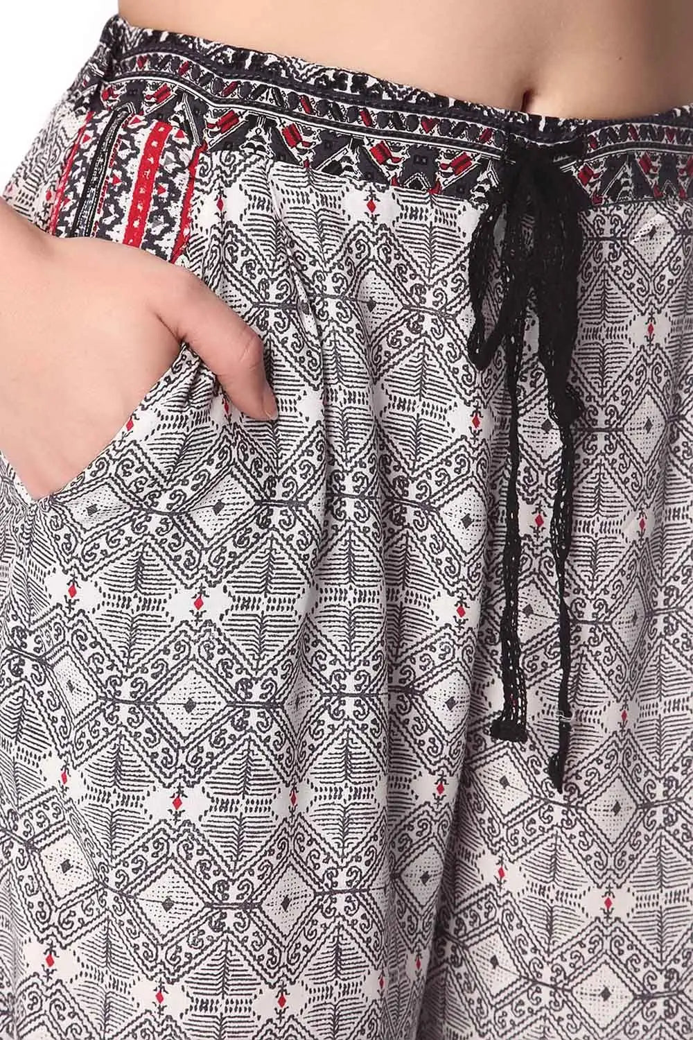 Black wide leg pants in ethno print with eyelash lace insert - Pants