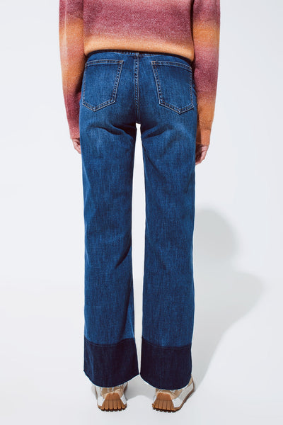 Blue flaired jeans with dark blue hem