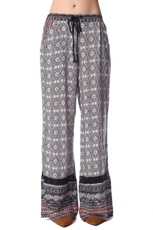 Blue pants in ethno print with wide leg and eyelash lace insert - Pants
