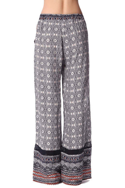 Blue pants in ethno print with wide leg and eyelash lace insert