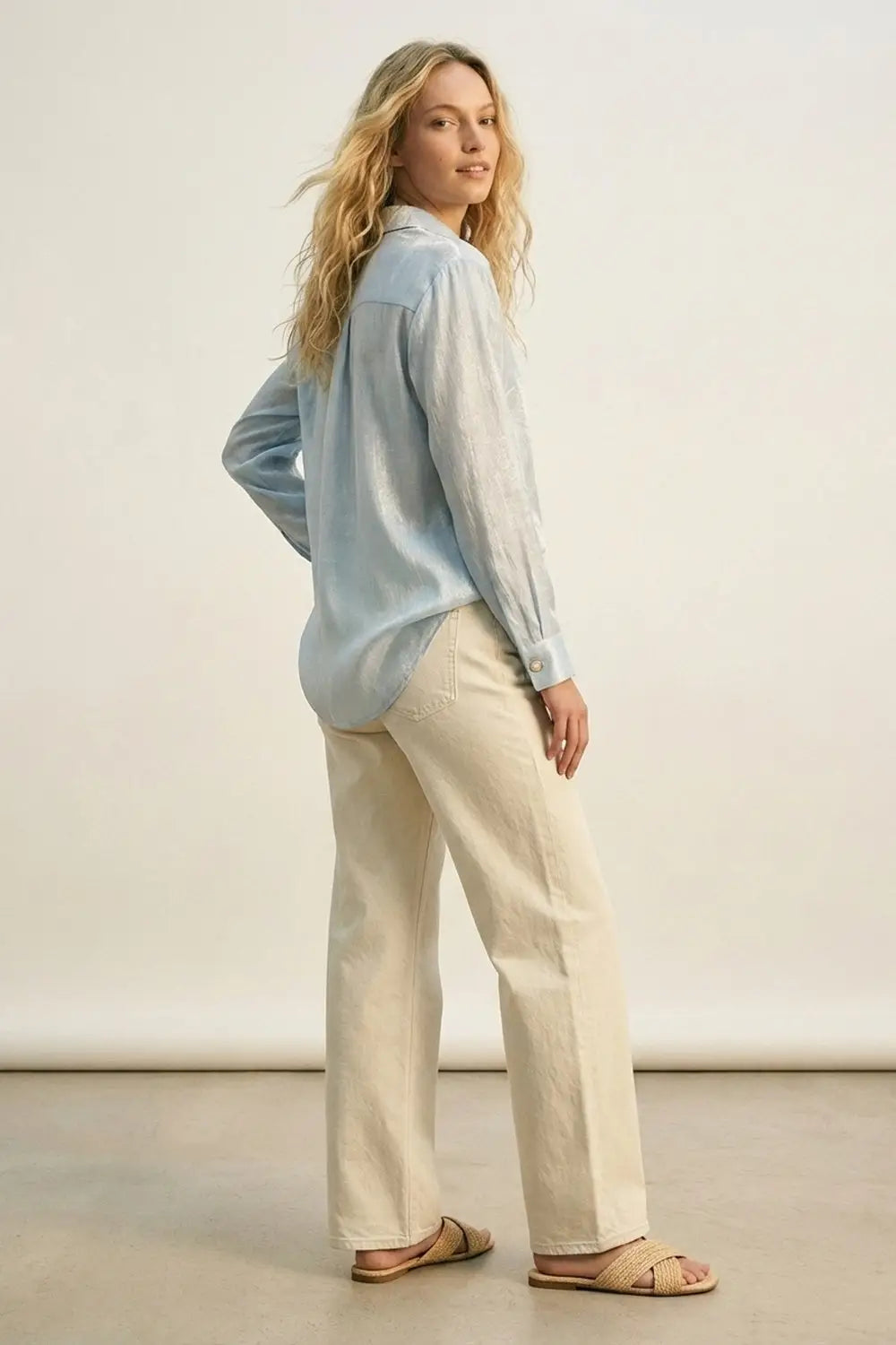 Q2 bright blue knit blouse with retro buttons