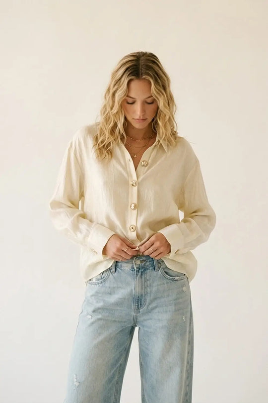 Q2 bright fabric beige blouse with retro buttons