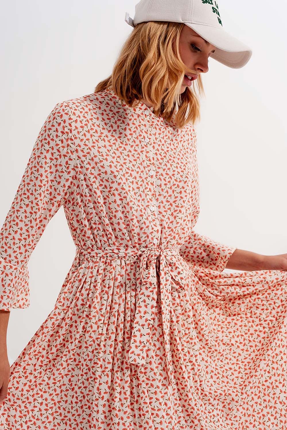 Buttoned midi dress with high collar in floral print coral