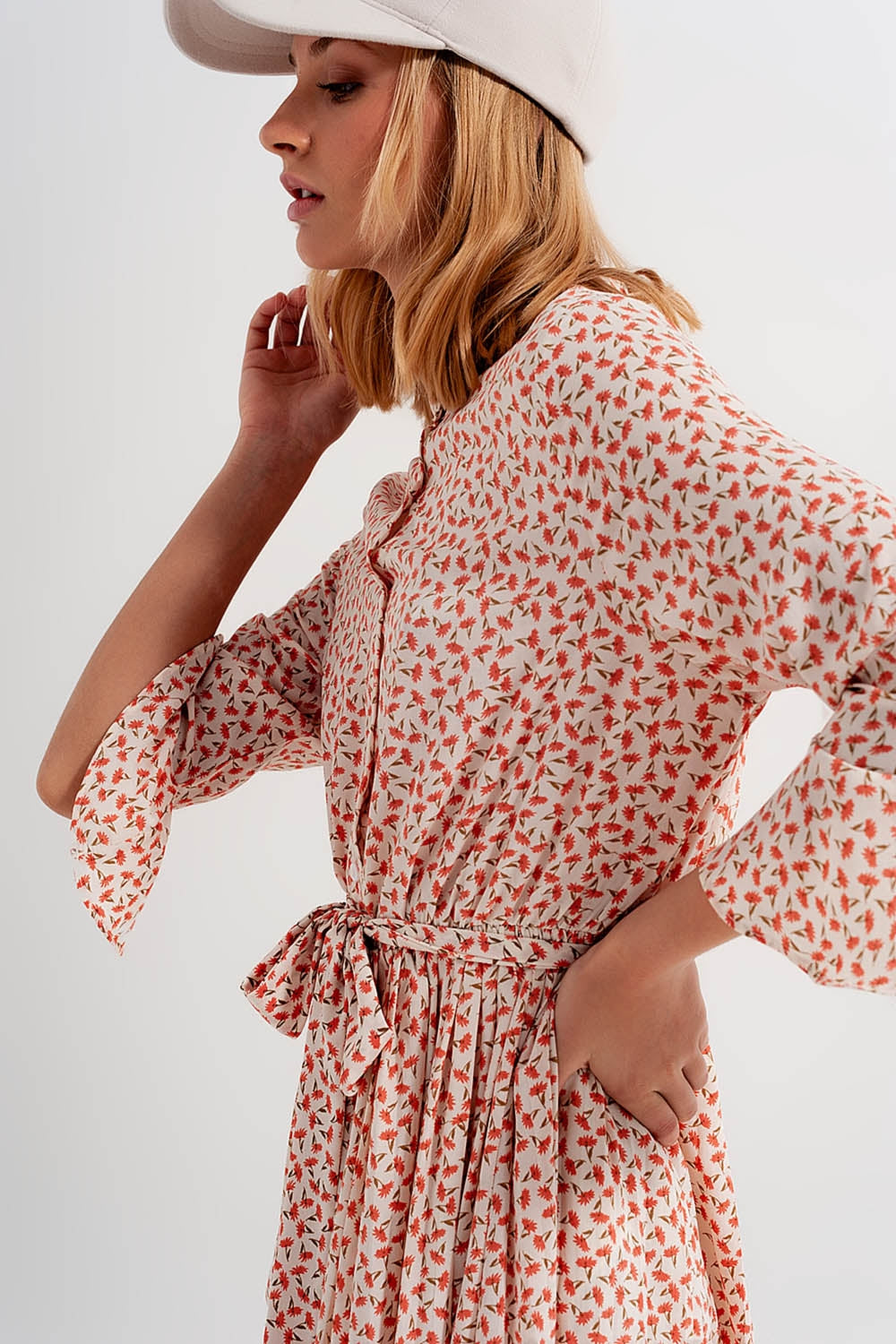 Buttoned midi dress with high collar in floral print coral