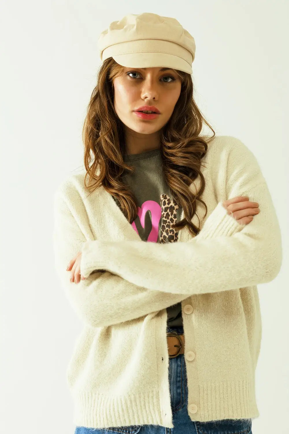 Cardigan à manches longues de couleur crème avec fermeture sur le devant par des boutons - Pulls