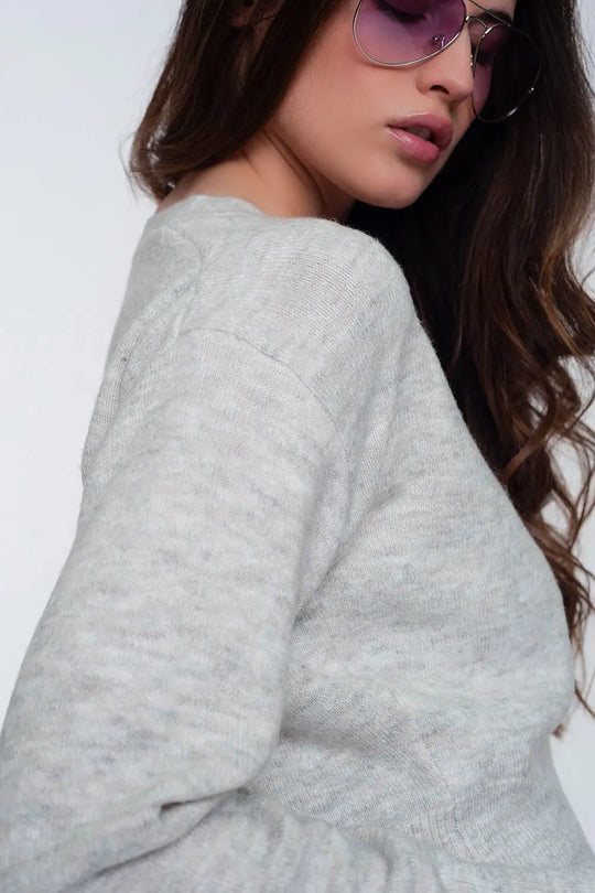 Cardigan court en maille avec boutonnage sur le devant gris clair - Pulls