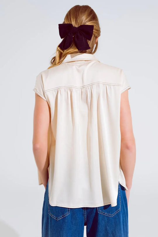 Chemisier sans manches à col polo en beige - Tee-Shirt