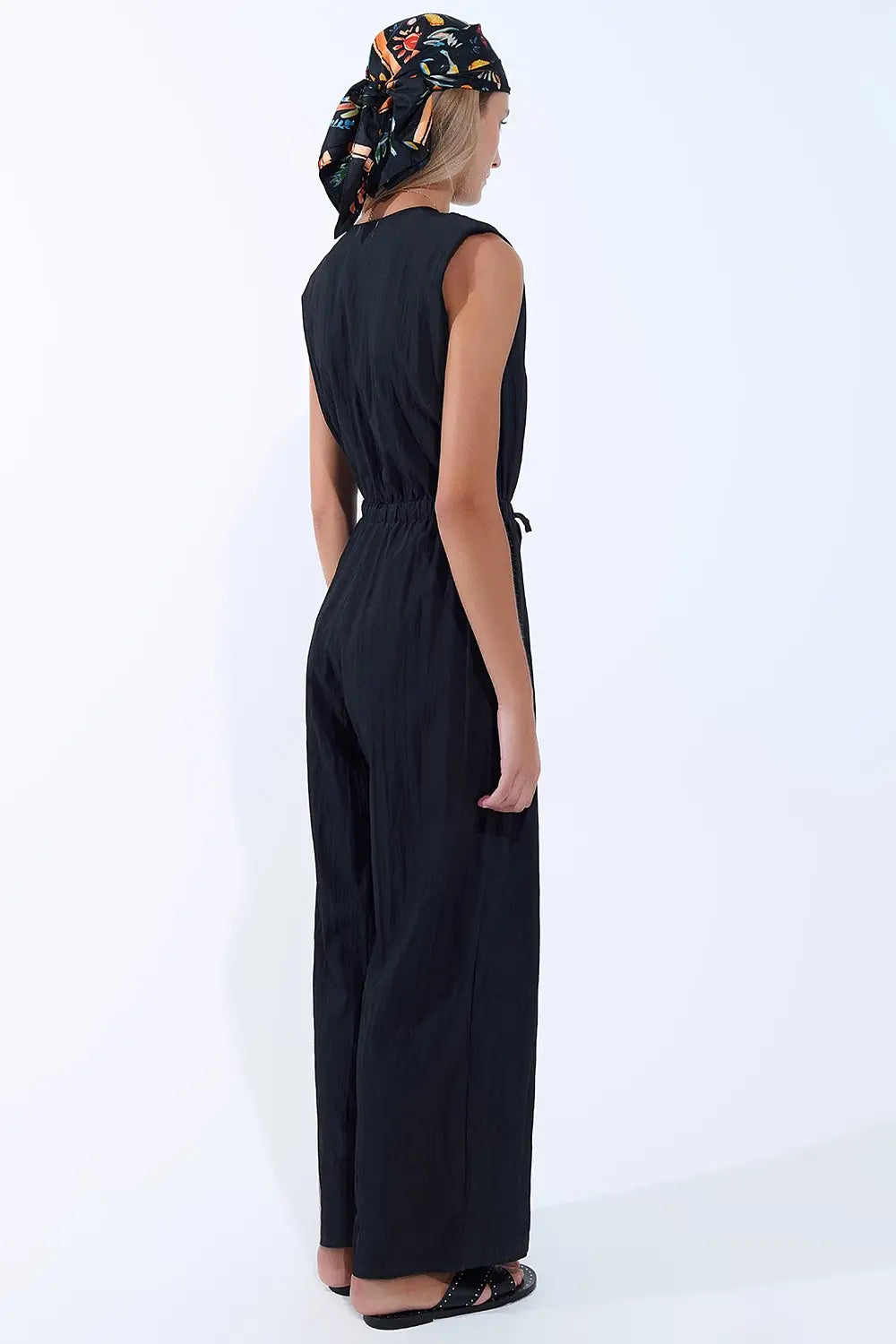 combinaison noire drapée en tissu froissé - Vestidos
