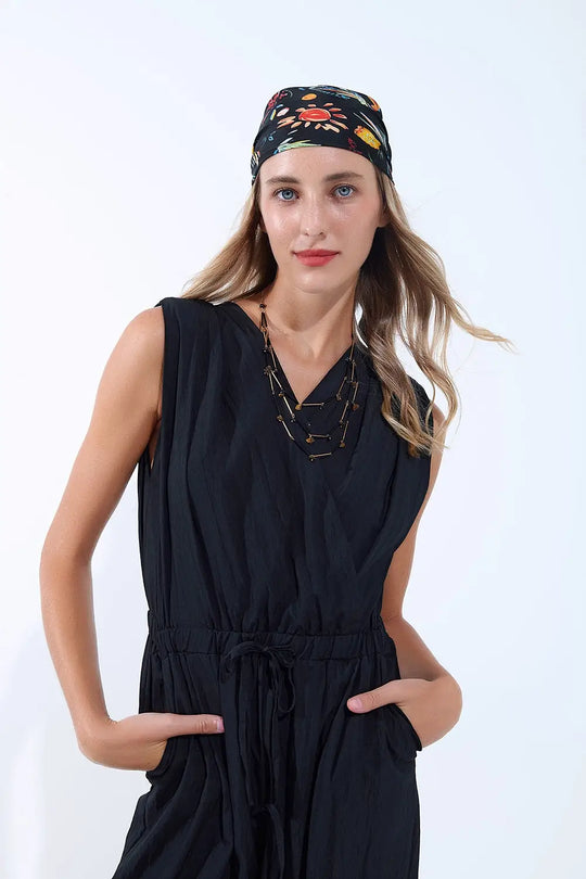 combinaison noire drapée en tissu froissé - Vestidos