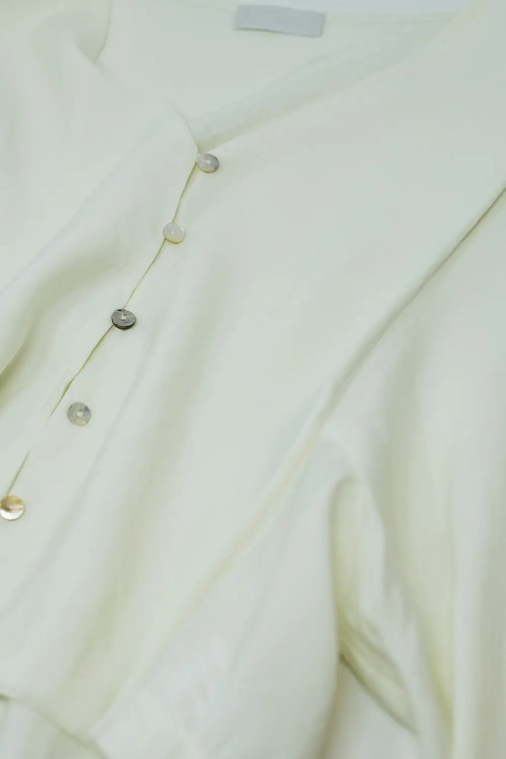 Cream blouse with balloon sleeves and frontal closure with buttons - Sweaters