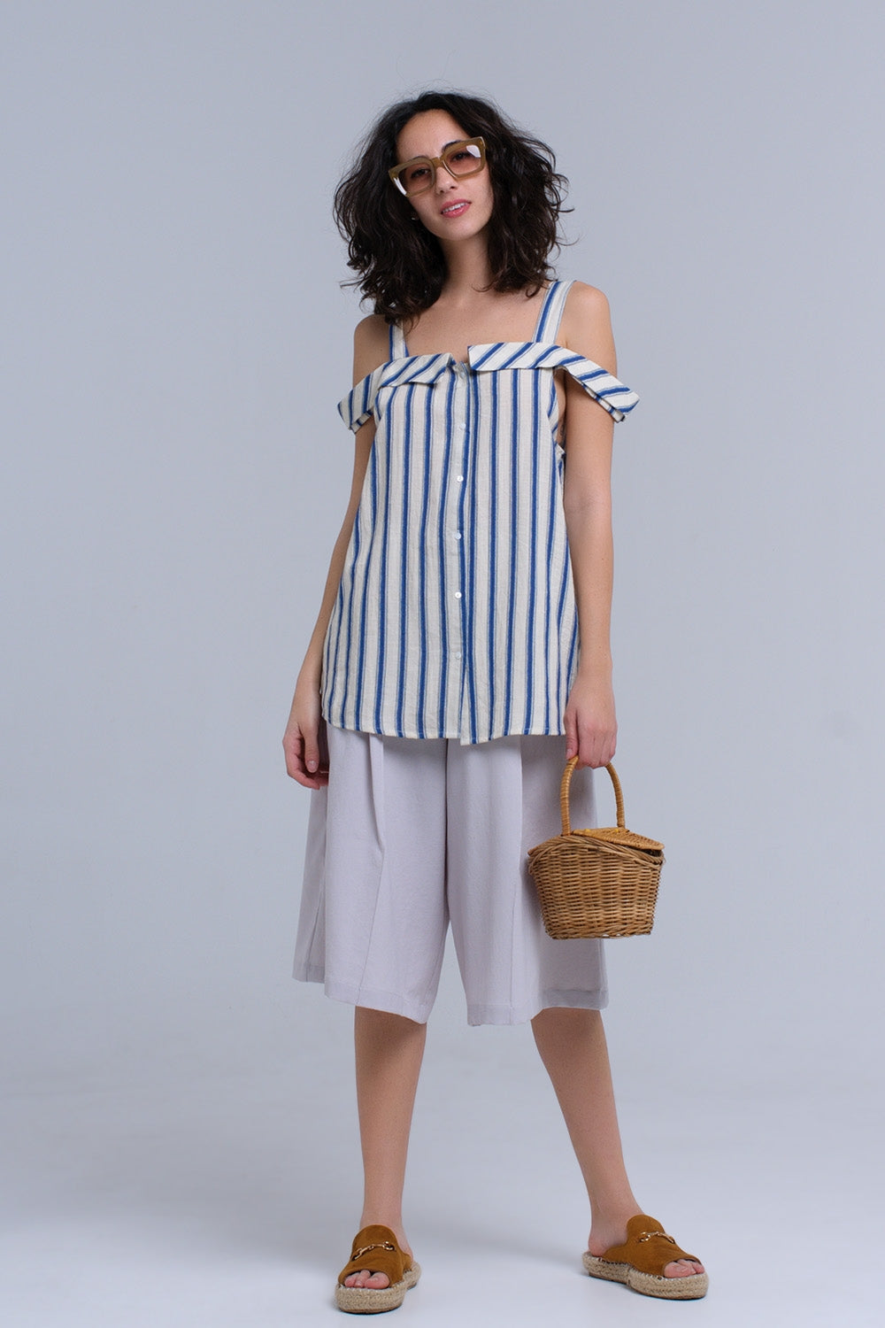 Cream top with blue stripes