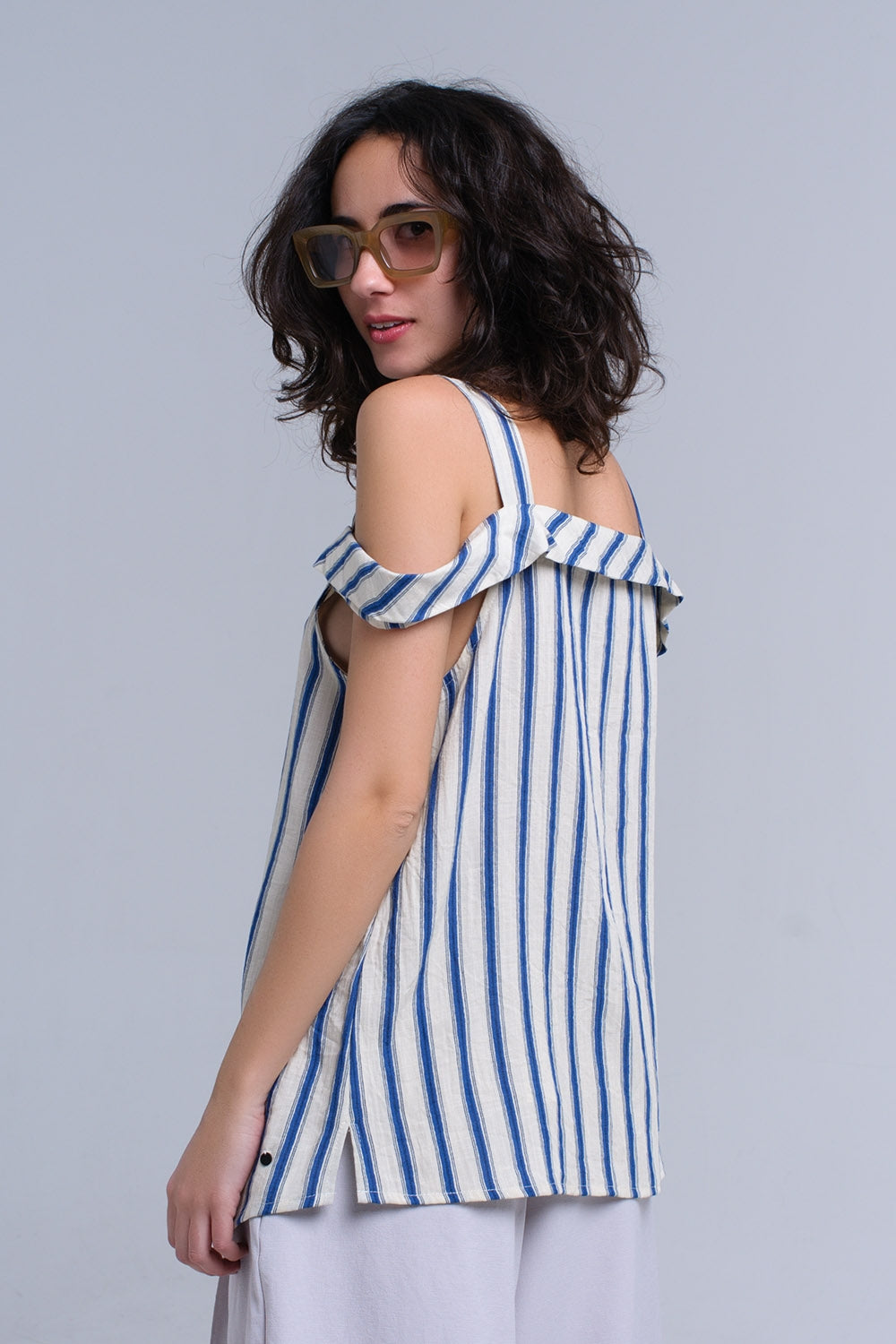 Cream top with blue stripes