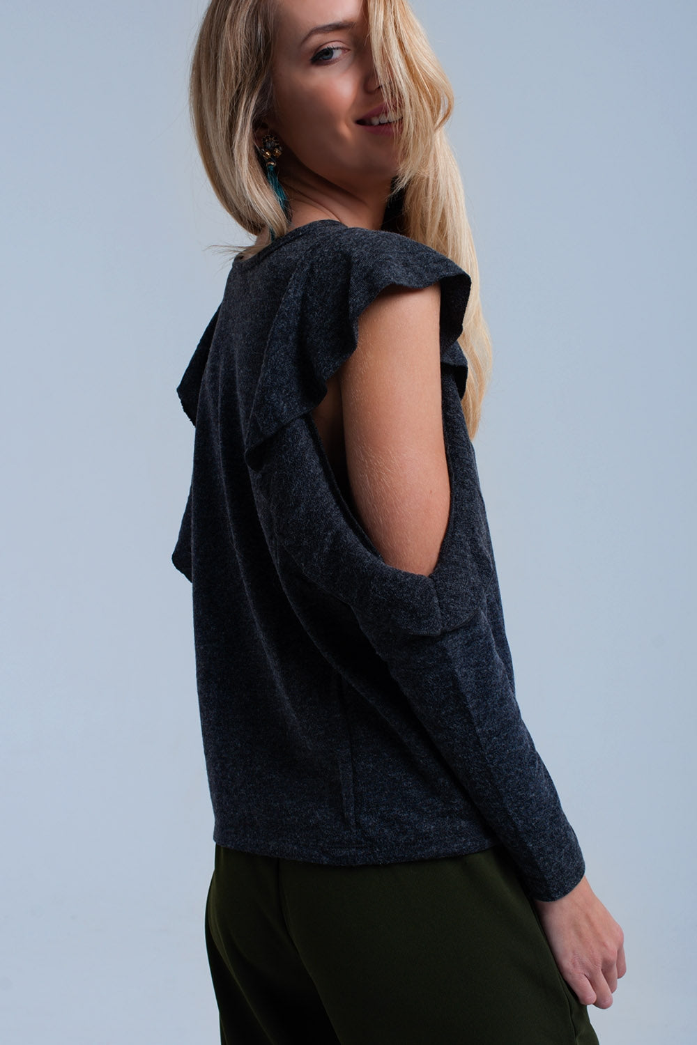 Q2 Dark gray top with ruffle and open detail